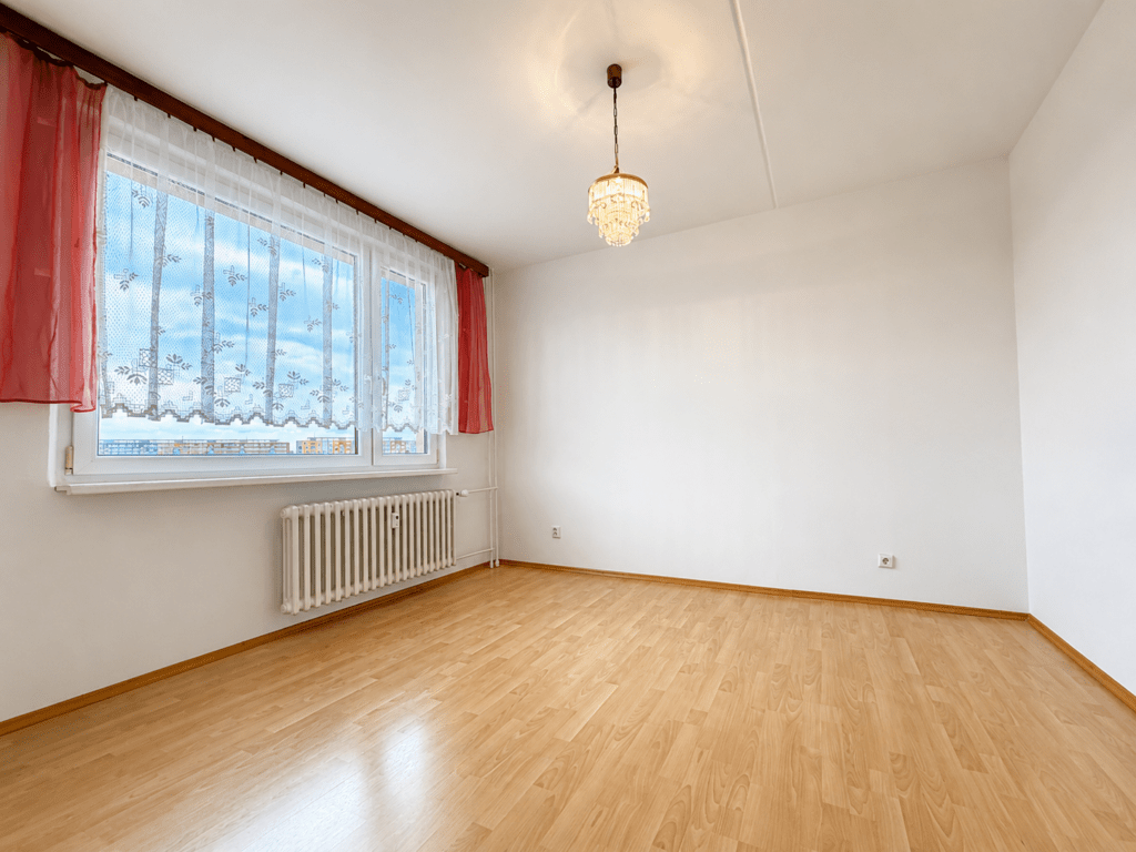 Prostorný byt s balkónem